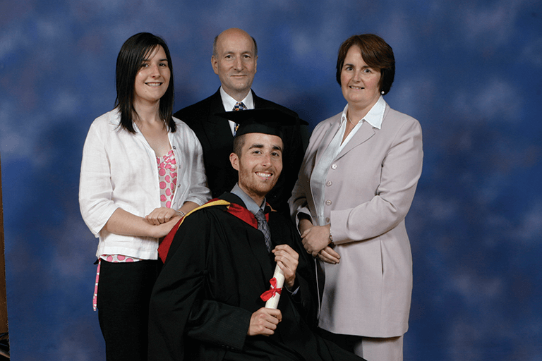 Jake Thompson with his family at his graduation.